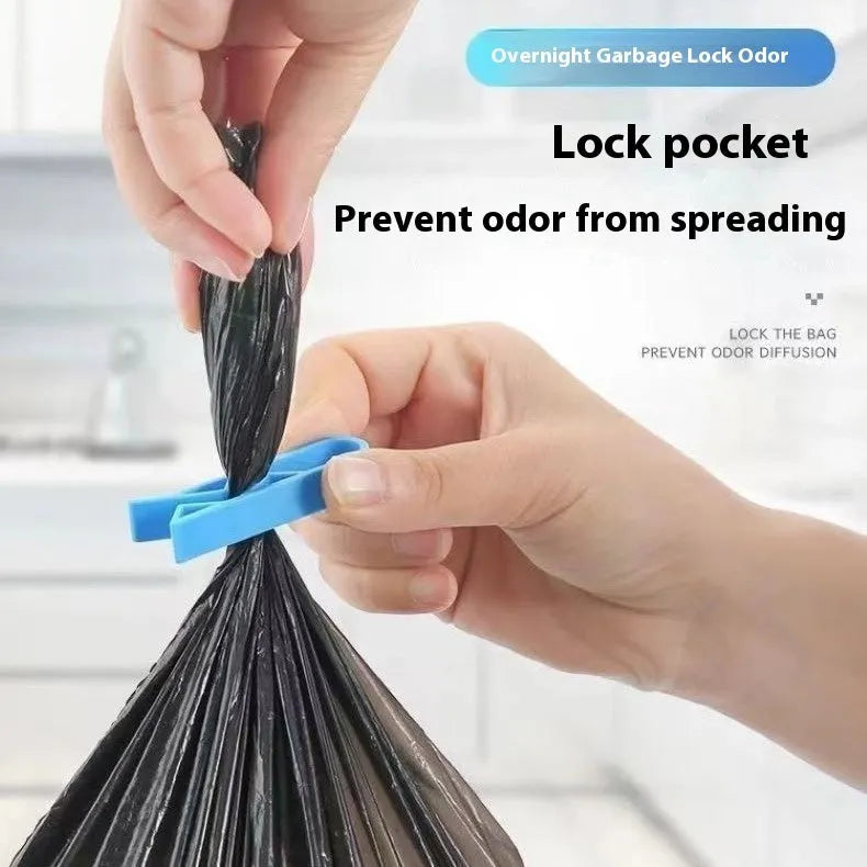 White PP plastic non-slip clip for holding a garbage bag onto a rubbish bin.