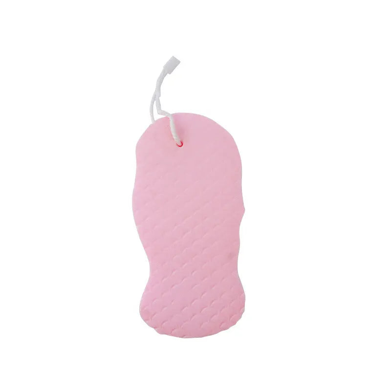 3D fish scale pattern bath sponge ball in assorted colours on a bathroom background.