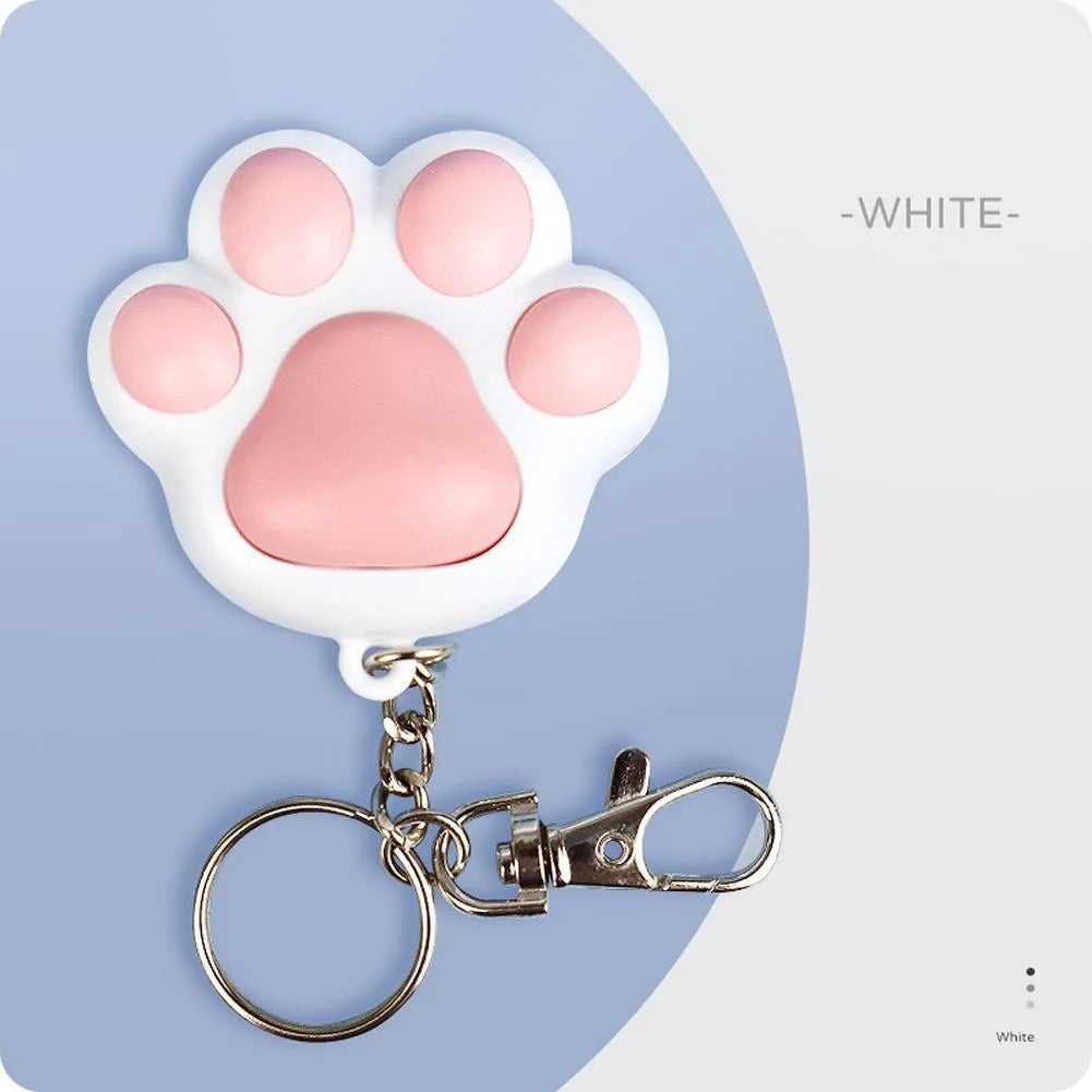 Black or pink infrared cat teaser key chain toy with USB charging port measuring 5 x 2.5cm