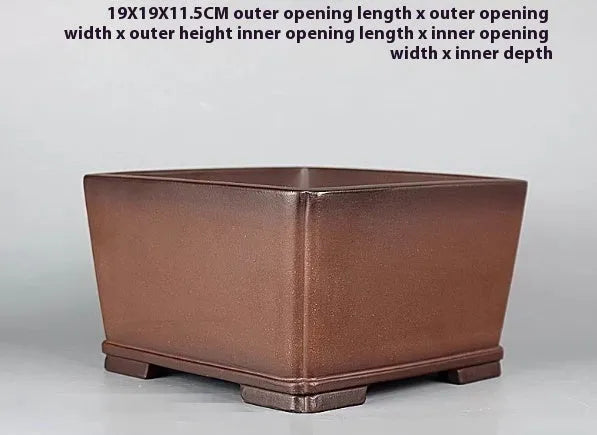 Brown handmade antique purple clay flower pot measuring 19x19x11.5 cm