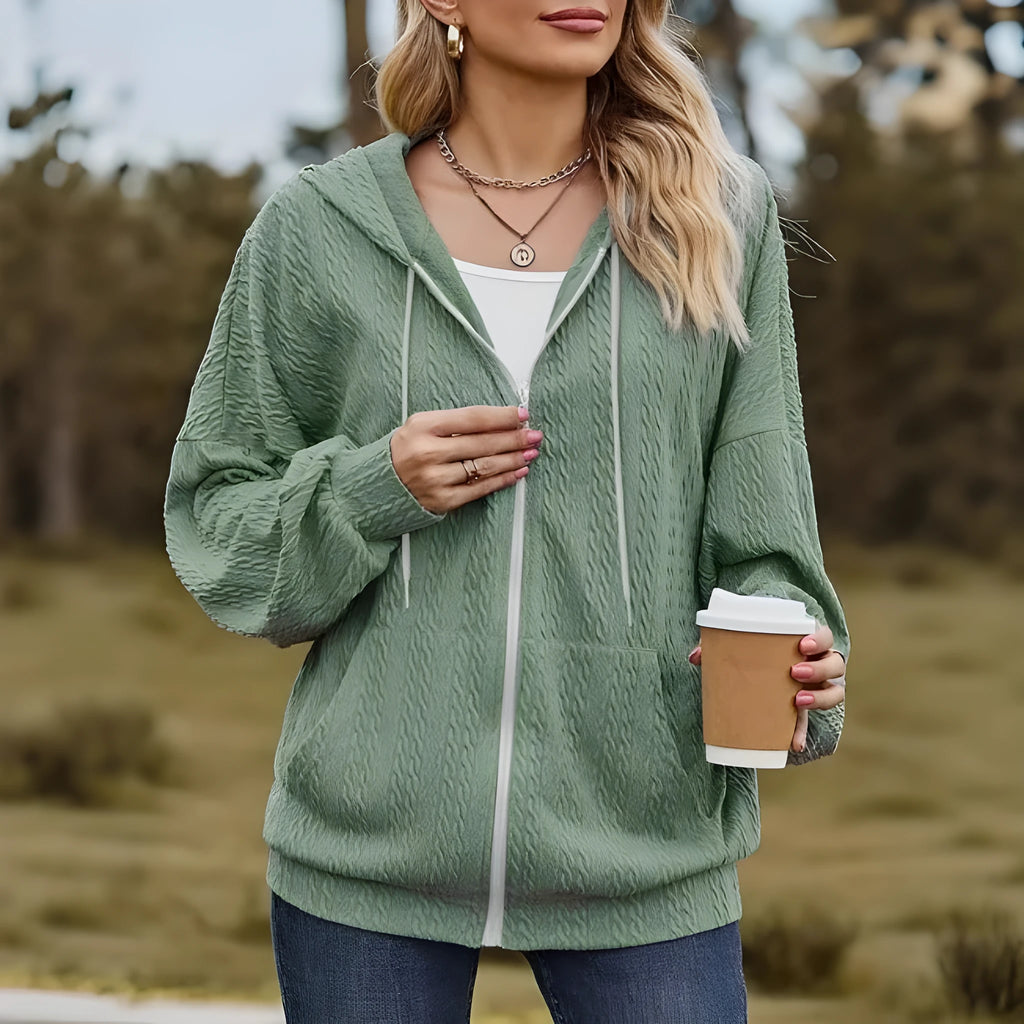 Green women's loose-fit hooded sweater coat with a full-length front zipper.