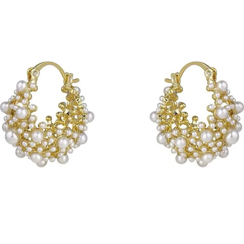 Gold-colour women's flower basket earrings with copper construction and small bead inlay detail.