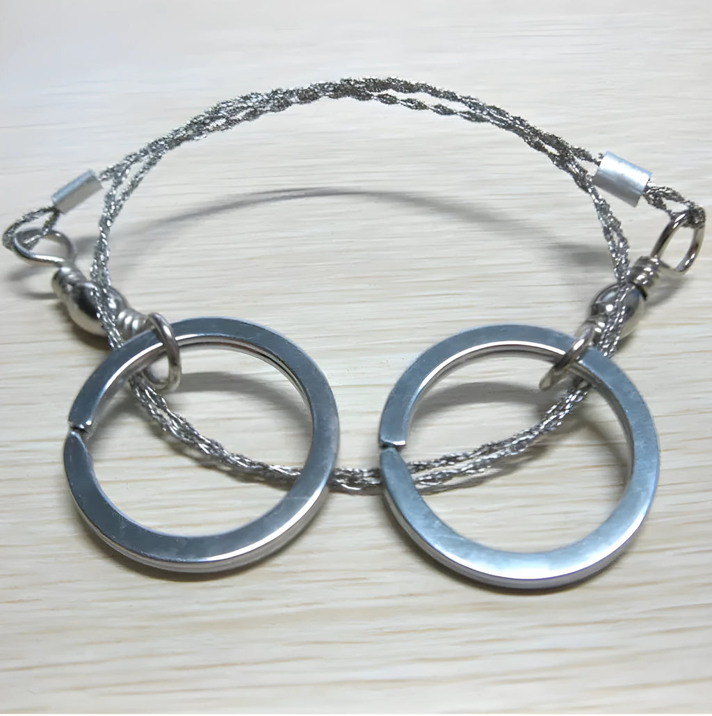 55cm survival wire saw with stainless steel blade and thumb rings for outdoor cutting