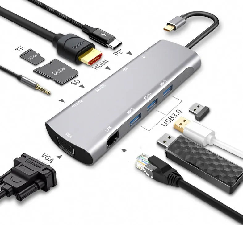 Grey aluminium USB-C docking station showing HDMI, VGA, USB 3.0, and USB-C PD charging ports.