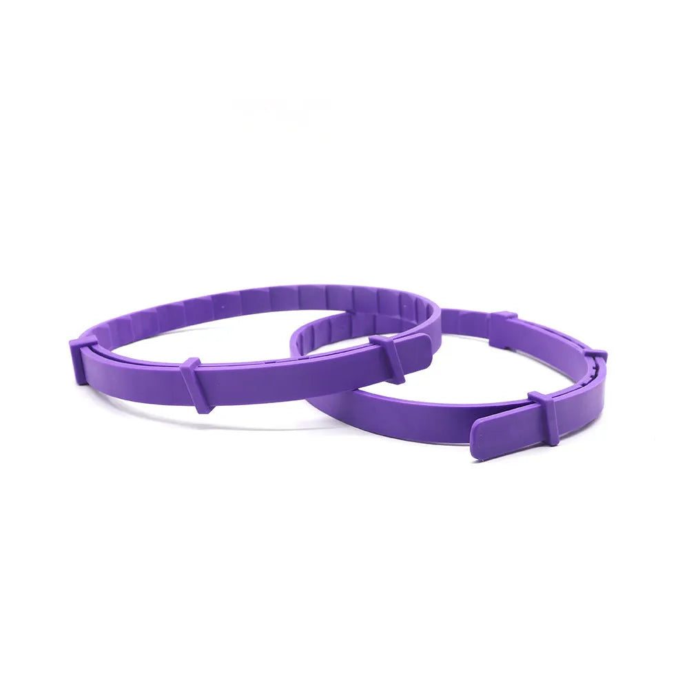 Four dog anxiety relief collars in different colours featuring a Chinese-style monochrome pattern.