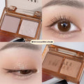 Cool two-tone eyeshadow palette showing pink and black matte and shimmer shades for punk and festival makeup looks