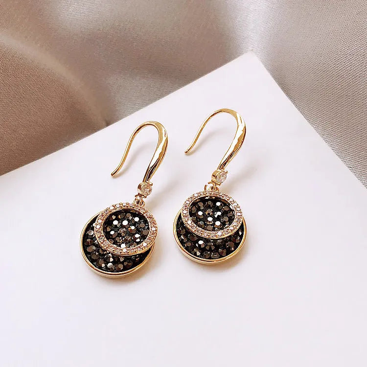 Black retro-style geometric alloy earrings for women, 3.6cm long round piece design.