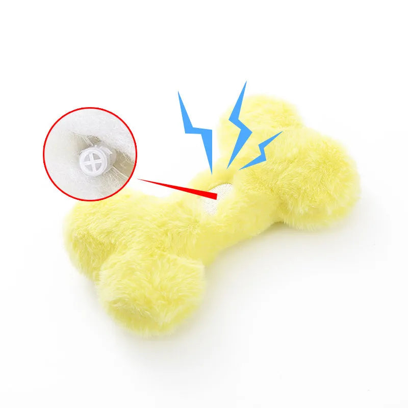 Vocal bone plush dog toy for aggressive chewers in blue, pink and yellow colours with internal squeaker