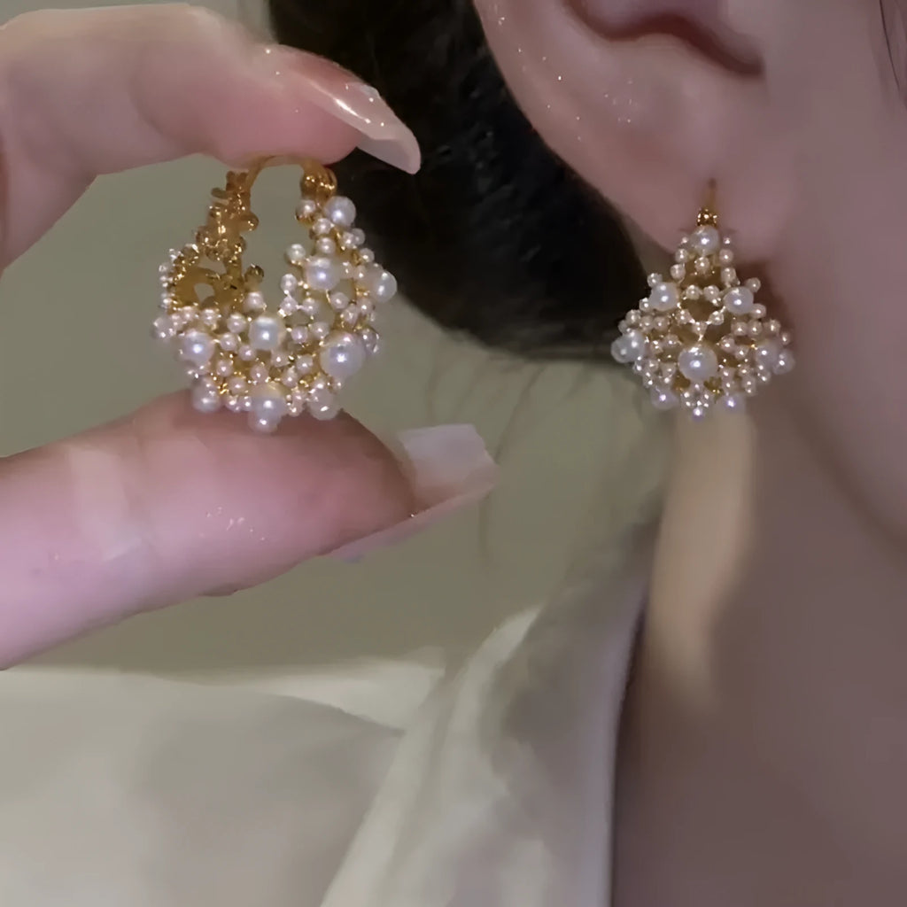 Gold-colour women's flower basket earrings with copper construction and small bead inlay detail.