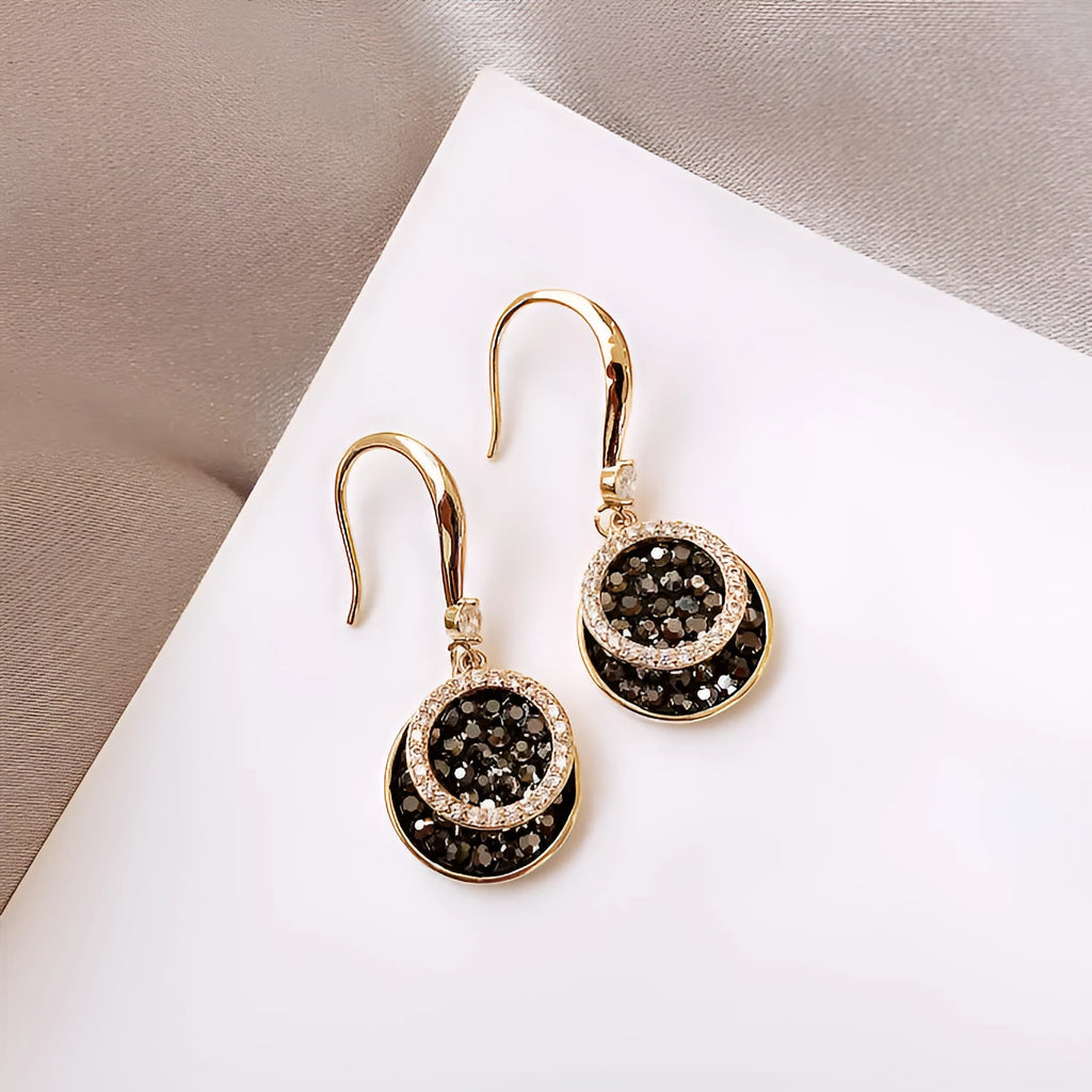 Black retro-style geometric alloy earrings for women, 3.6cm long round piece design.