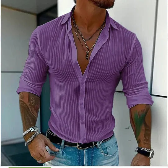 Man wearing a striped British style loose fit long sleeve cardigan shirt.