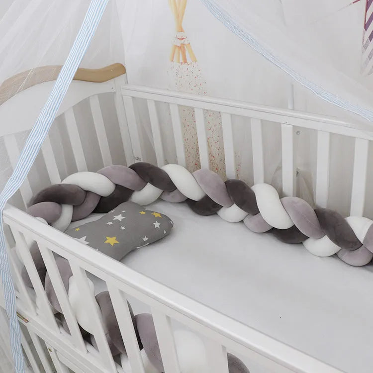Braided knot baby crib bumper pillow in spandex velvet showing bendable design and colour options.