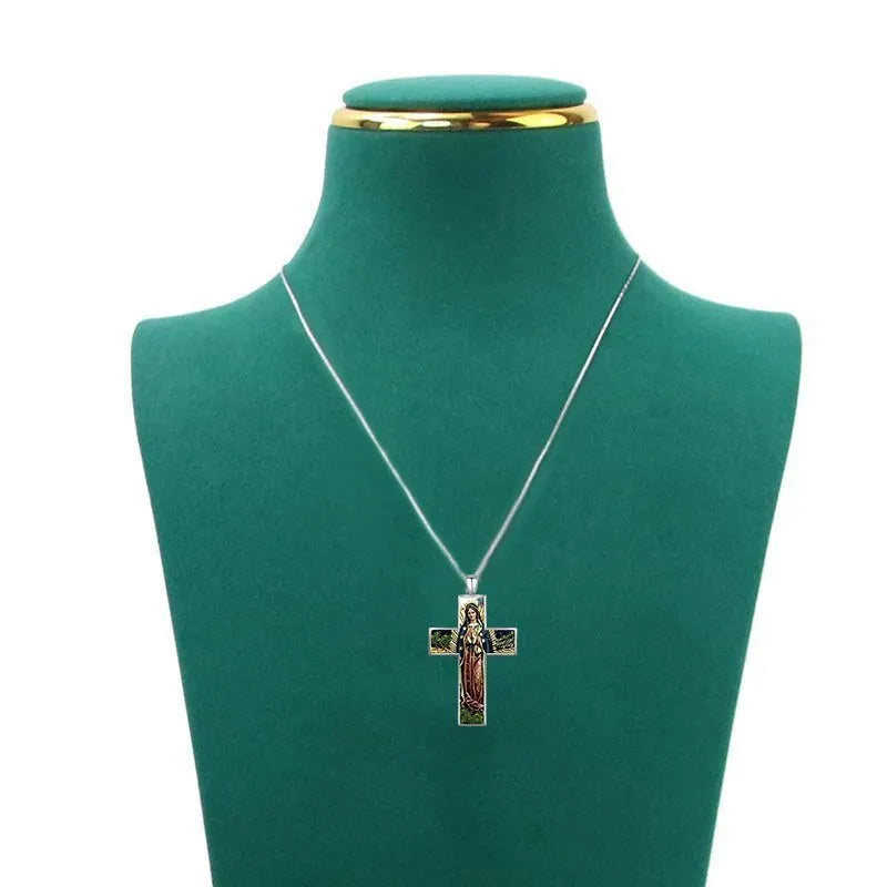 Silver alloy women's necklace with creative painted cross pendant on white background
