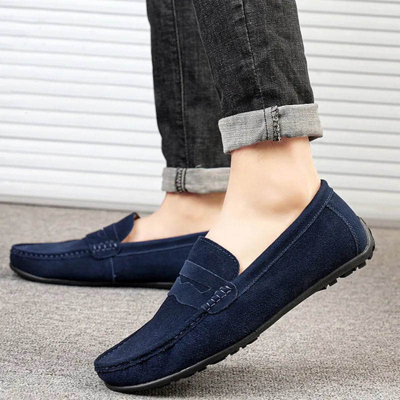 Men's solid colour suede loafers with round toe and slip-on design on rubber sole