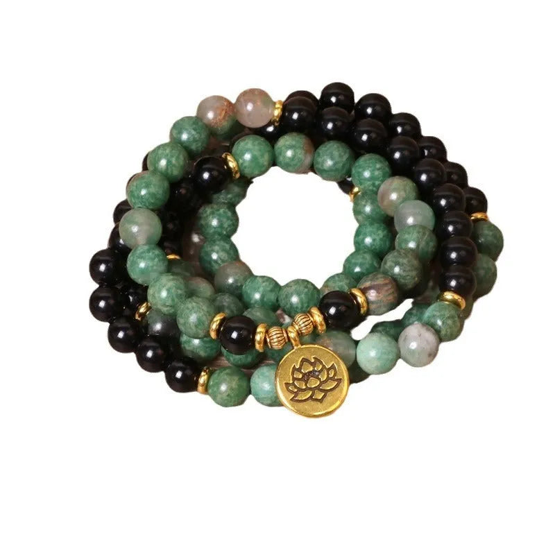 Green and black elastic beaded bracelet with alloy construction and natural style