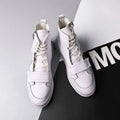 Men's black PU leather ankle boots in high-top sneaker style for winter wear