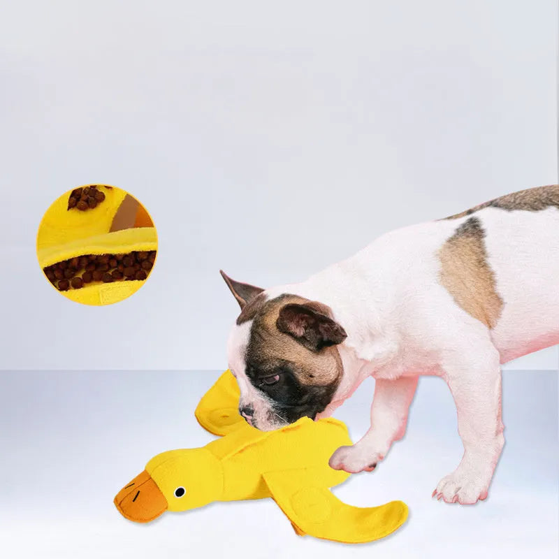 Yellow teddy fabric duck-shaped dog toy with squeaker and hidden food compartment