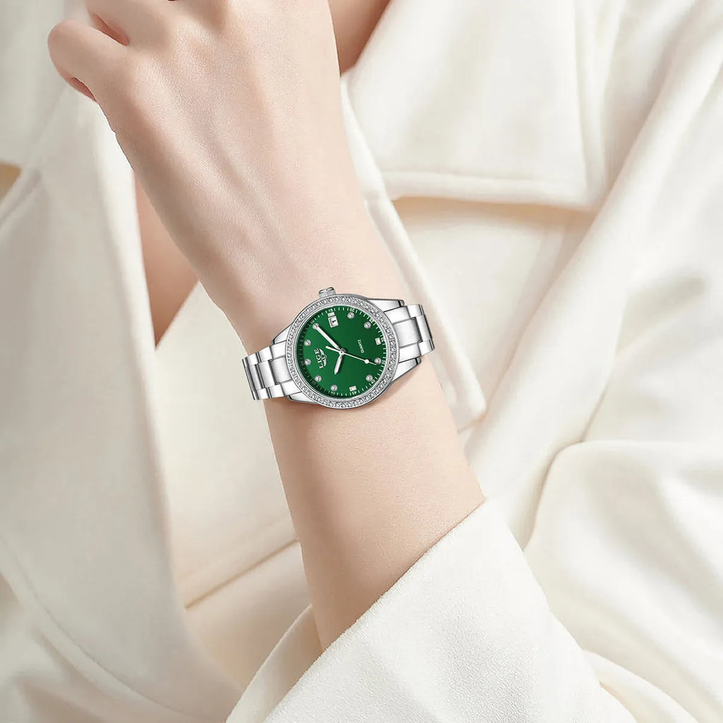 Women's silver-tone fashion watch with diamond bezel, round 34mm dial and luminous hands