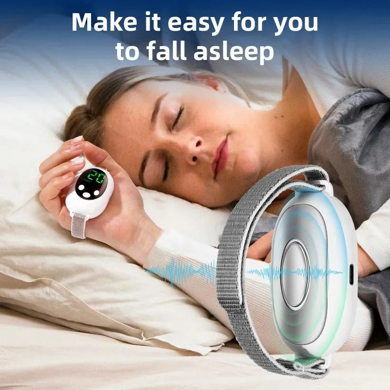 White insomnia help device with handheld remote control, sleep bracelet attachment, and USB charging cable