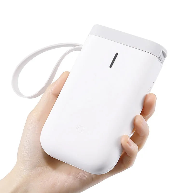 D11 Bluetooth thermal label printer in chosen colour next to smartphone showing label design app.