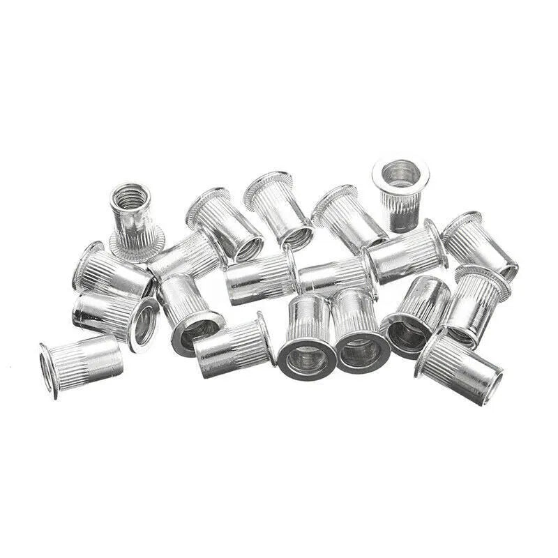 Alloy steel manual riveter nut gun tool with a selection of rivet nuts and mandrels from the set.