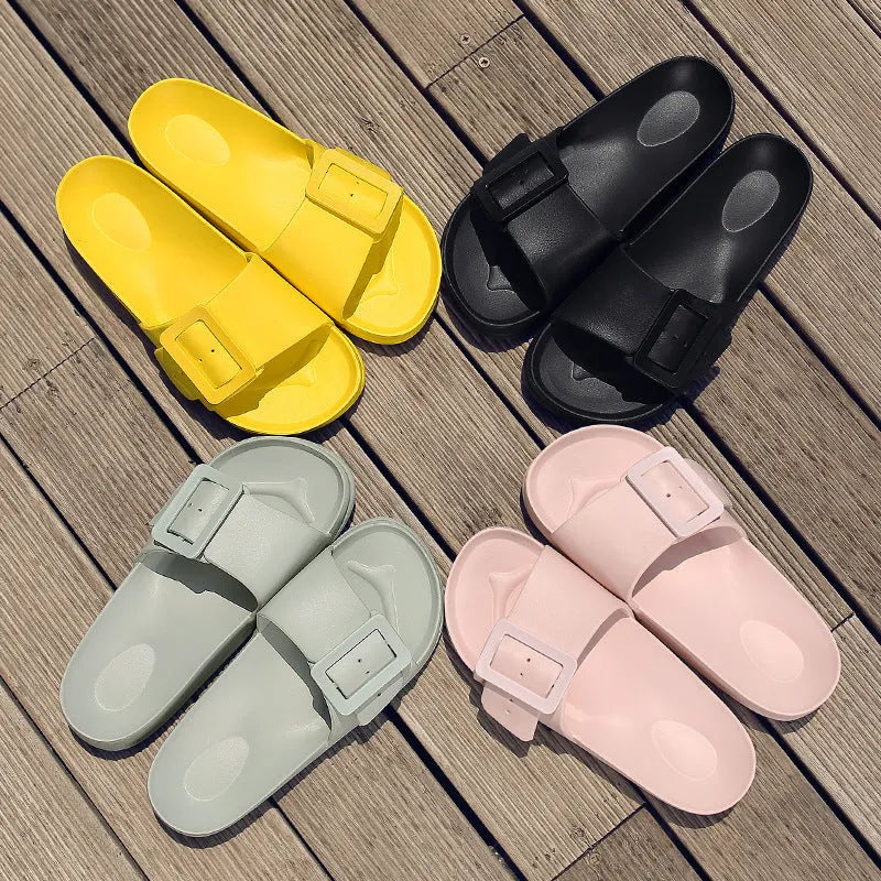 Women's EVA buckle fastening flip-flop slippers in assorted colours showing soft sole design