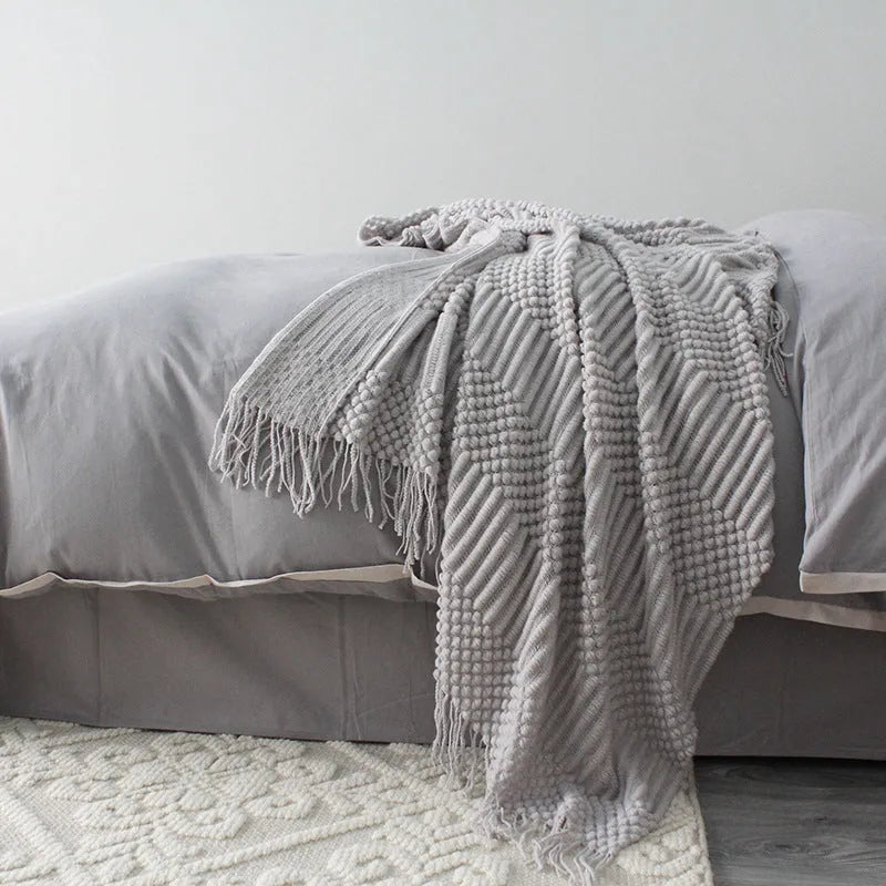 Small 127cm by 170cm polyester nap blanket shown in dark grey, khaki, and light grey colour options.