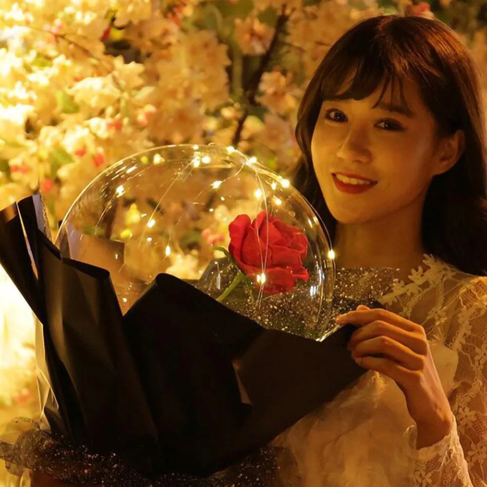 DIY LED luminous transparent balloon and artificial rose bouquet kit for party decoration.