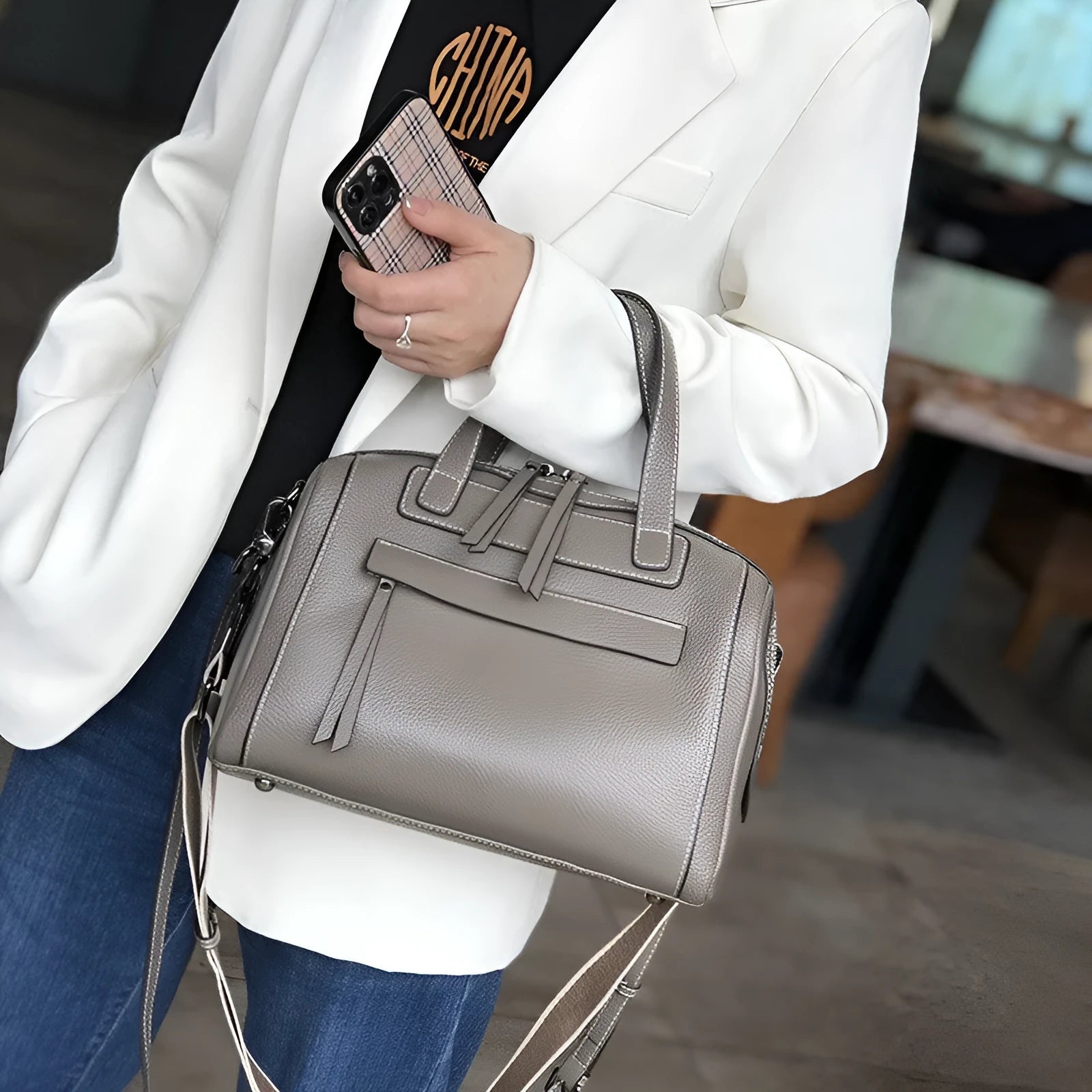 Genuine leather messenger bag with horizontal square shape and litchi pattern sewing detail