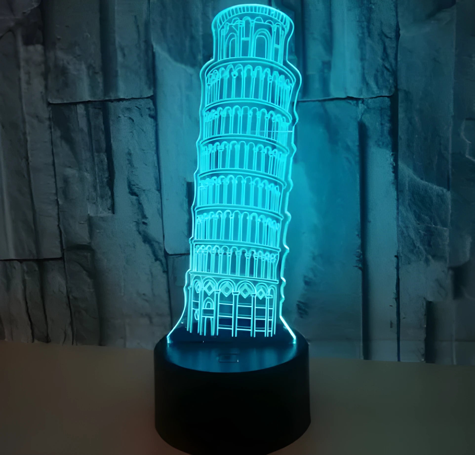 3D Leaning Tower of Pisa acrylic night light on black ABS base, displaying blue LED illumination.