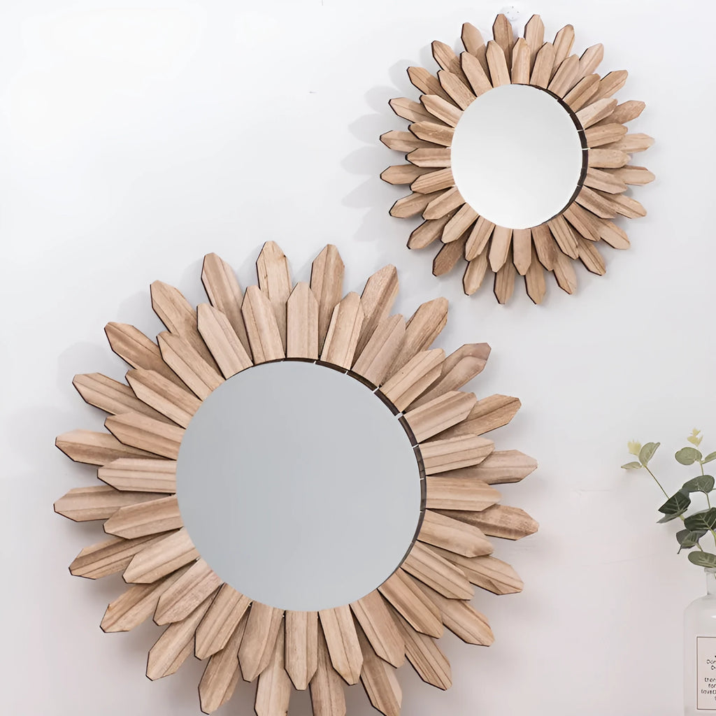 Circular wooden hanging mirror with a baked colour finish on a plain wall.