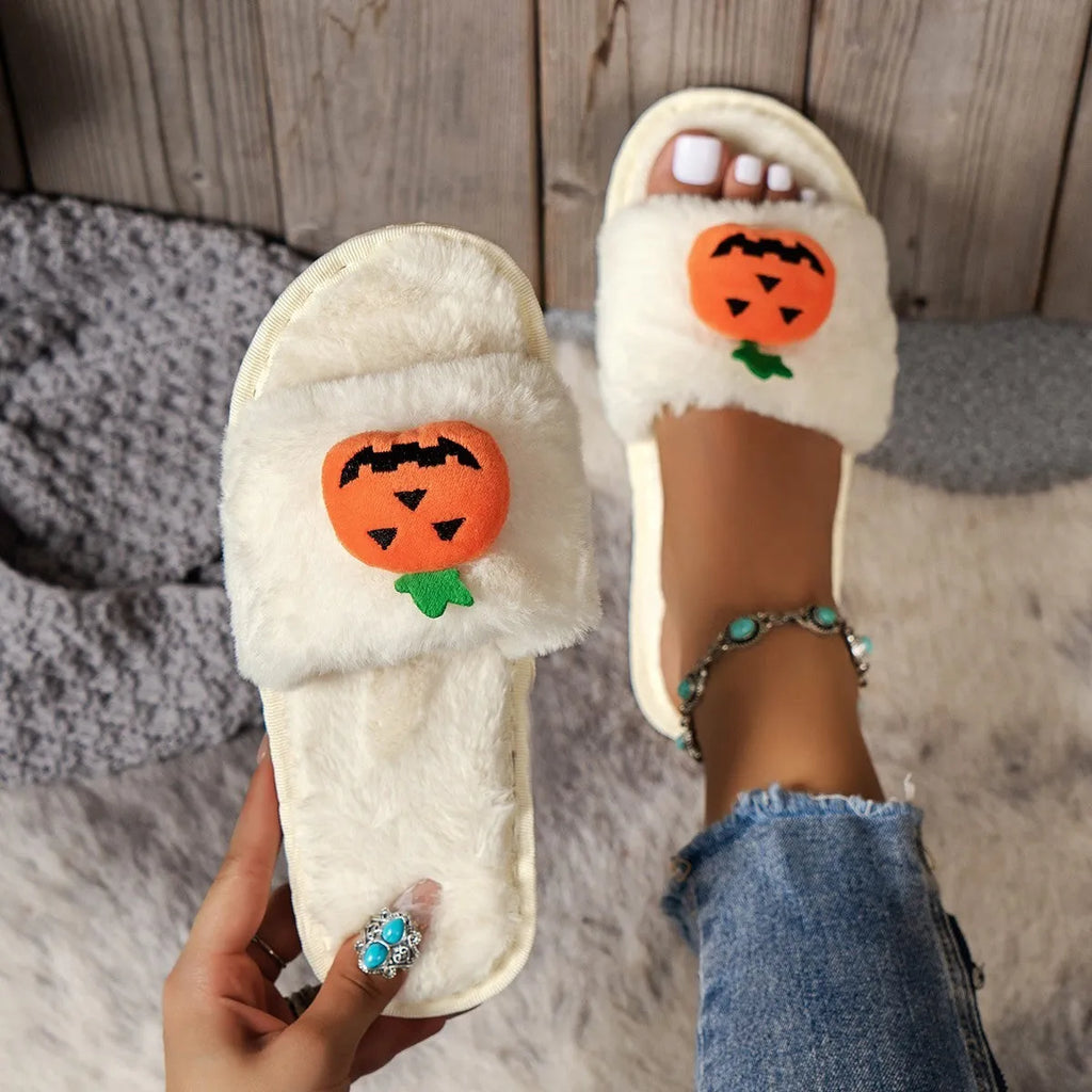 Halloween pumpkin plush slippers in white and yellow with synthetic fur and open toe design