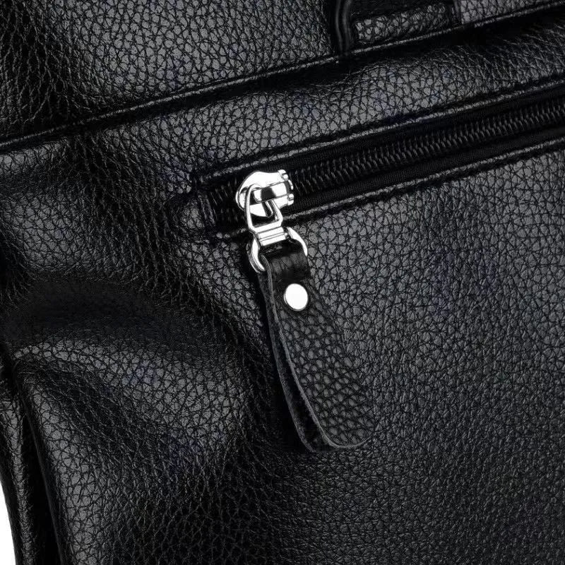 Men's black PU leather messenger bag with splicing design and crossbody strap