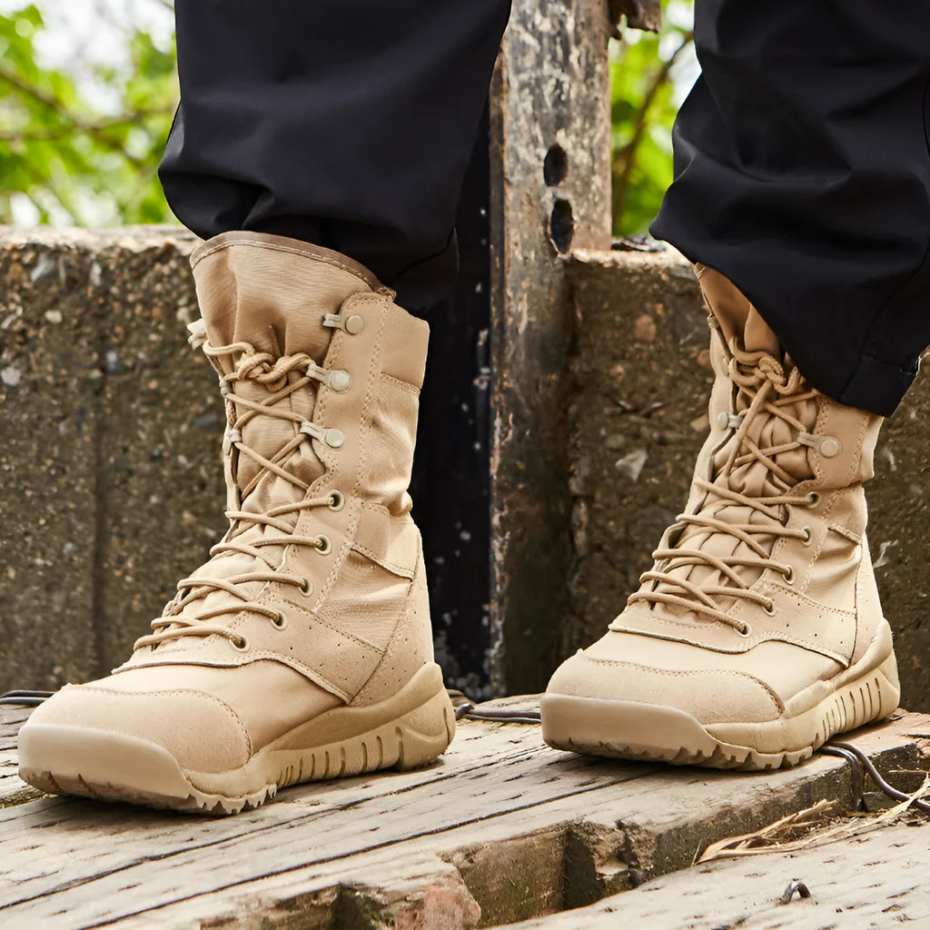 Yulong tactical desert combat boots in black and sand colour on a white background.