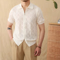 Cotton lapel cardigan top with zip front closure in light brown colour on hanger
