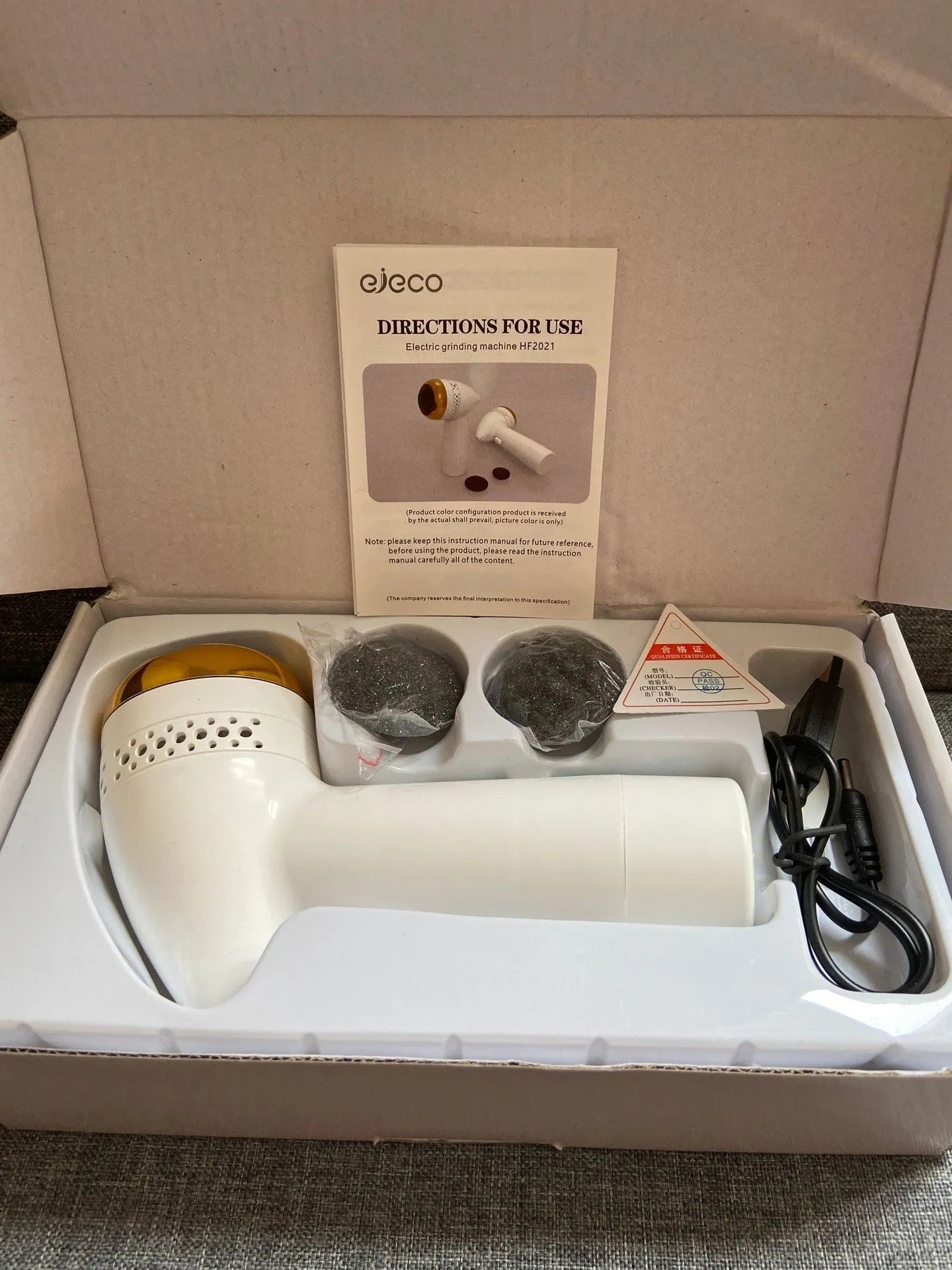 Electric vacuum foot grinder with a refined quartz grinding head in a metallic colour option.