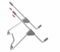 Grey aluminium and plastic adjustable stand holding a mobile phone and a laptop on a desk.