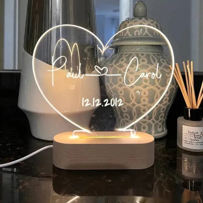 Custom acrylic LED night light displaying personalised names and date text
