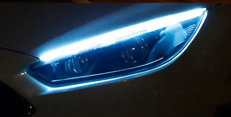 Slim silicone car LED strip for daytime running lights and flowing turn signals on a vehicle headlight.