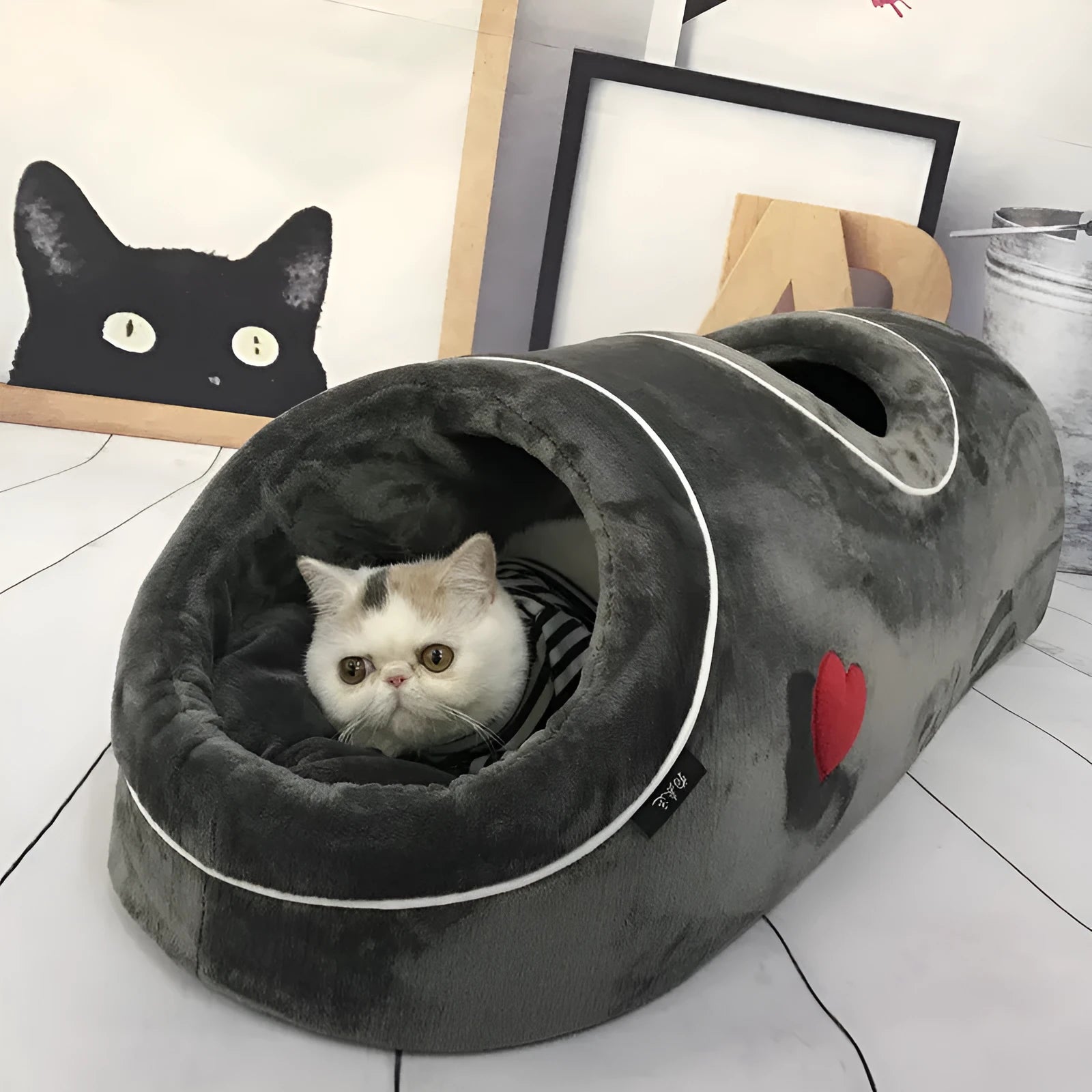 Double-hole flannel cat nest in grey with love heart pattern, 80x30x26cm, side view showing two openings