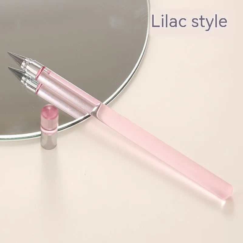 Clear acrylic sharpening-free eternal pencil with alloy tip on a desk