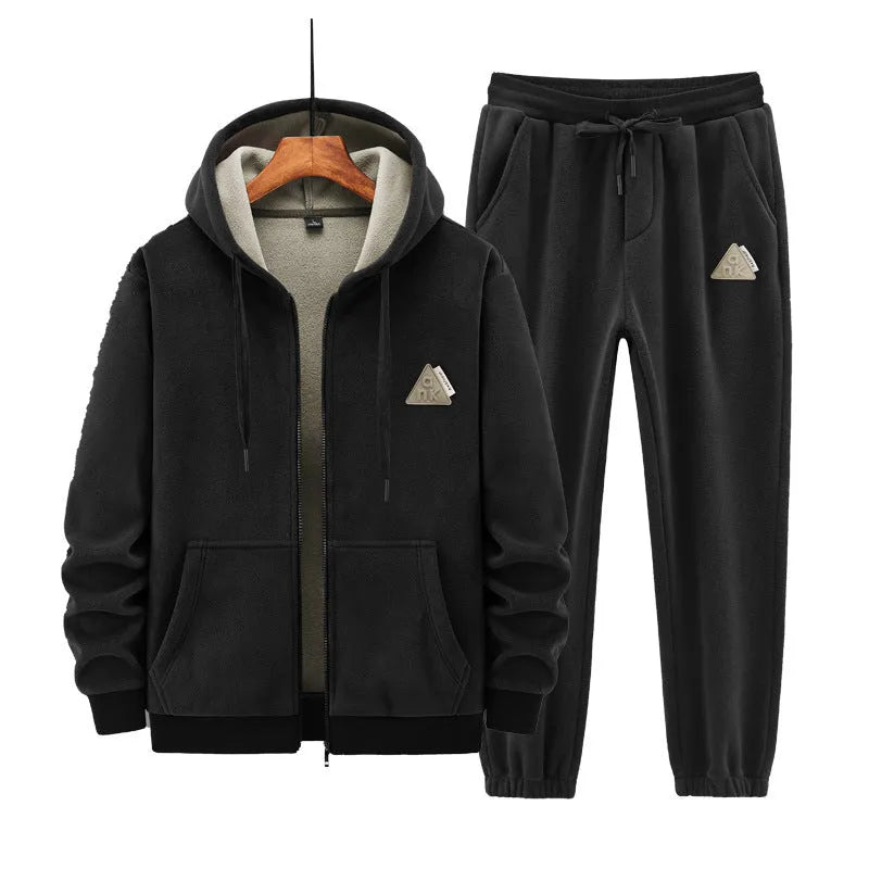 Grey cashmere-blend hooded sweater and matching trousers men's sports suit set on a hanger.