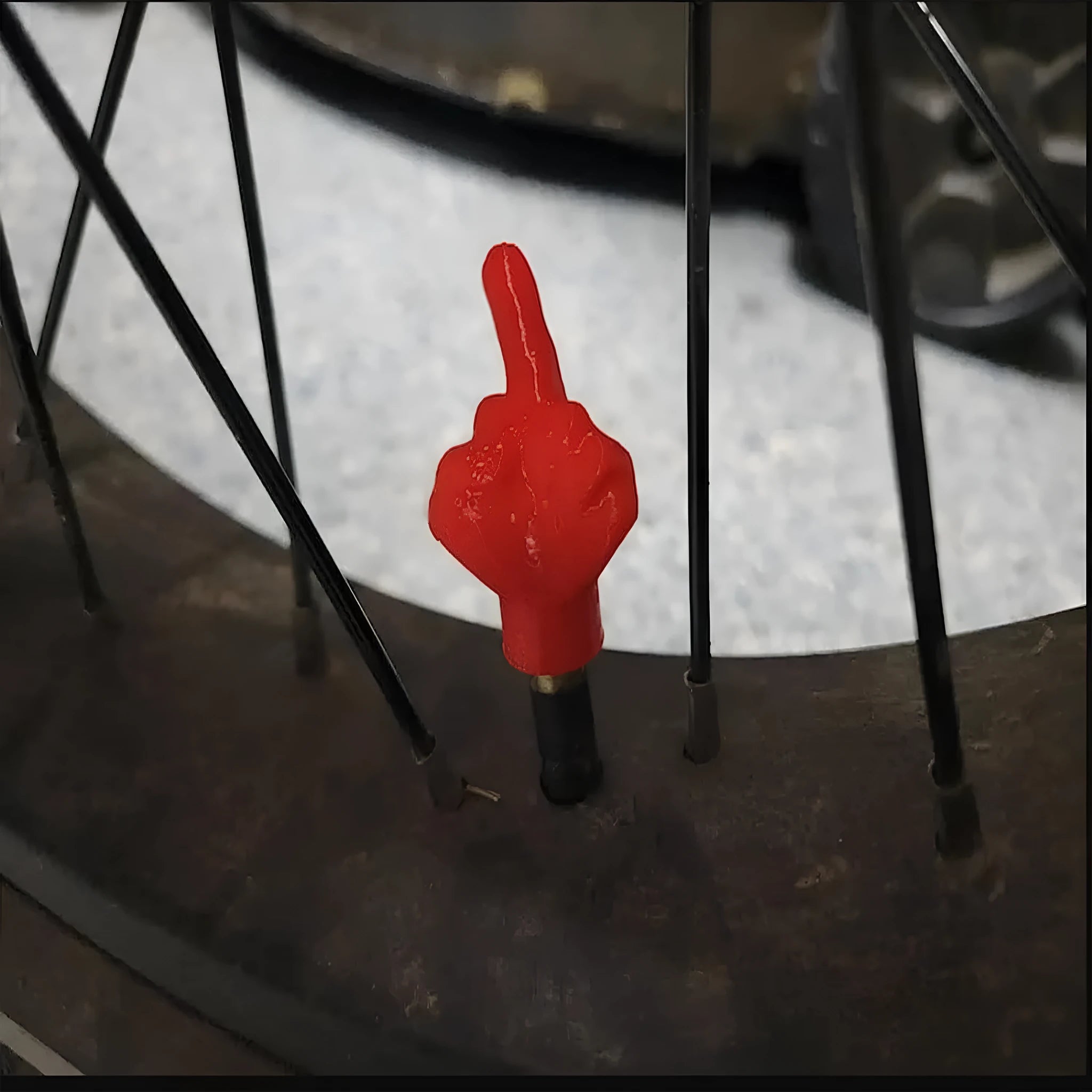 Eight latex tyre valve caps showing four black and four skin-coloured pieces for car tyre protection