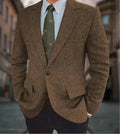 Men's brown herringbone suit jacket with long sleeves and retro business casual styling