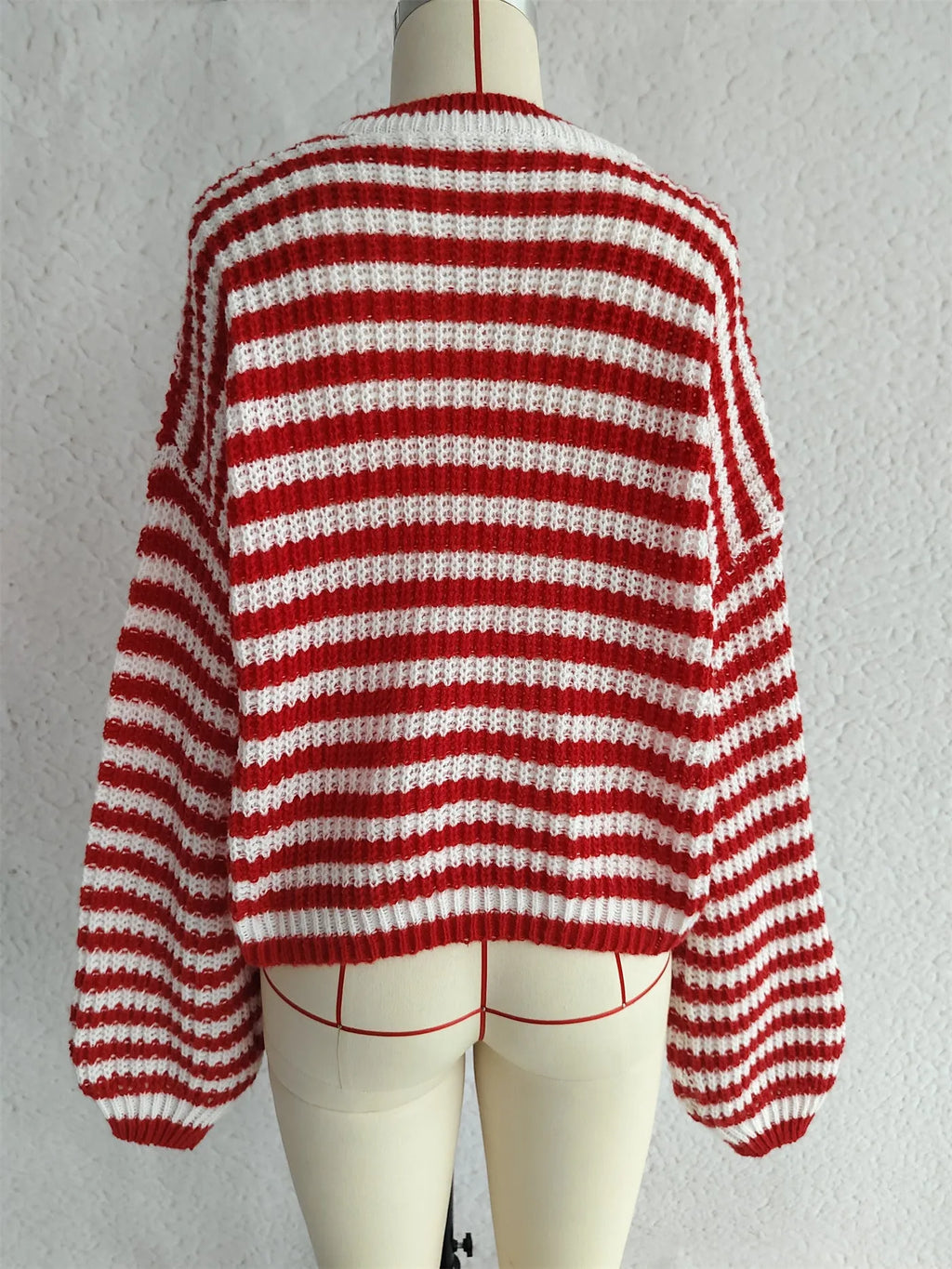 Women's vintage stripe knitted pullover sweater in loose fit, shown in a choice of colours.