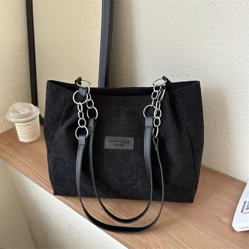 Corduroy tote bag with three-dimensional pockets in black colour option