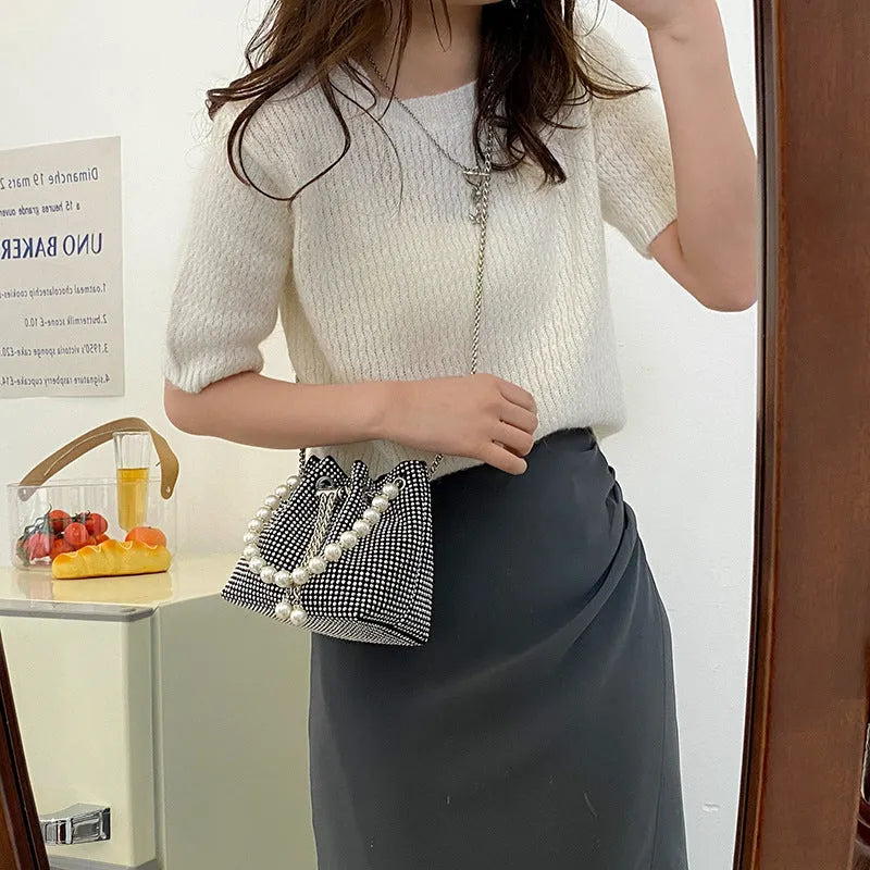 Women's light diamond shoulder bag with western chain strap in bucket shape