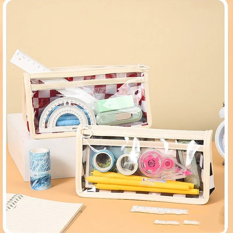 Transparent PVC pencil case with chessboard pattern measuring 21.5 cm long