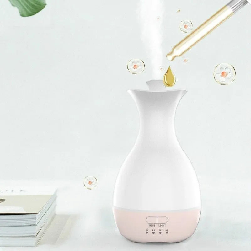 White ultrasonic aromatherapy vase diffuser with colourful LED night light and 200ml water capacity