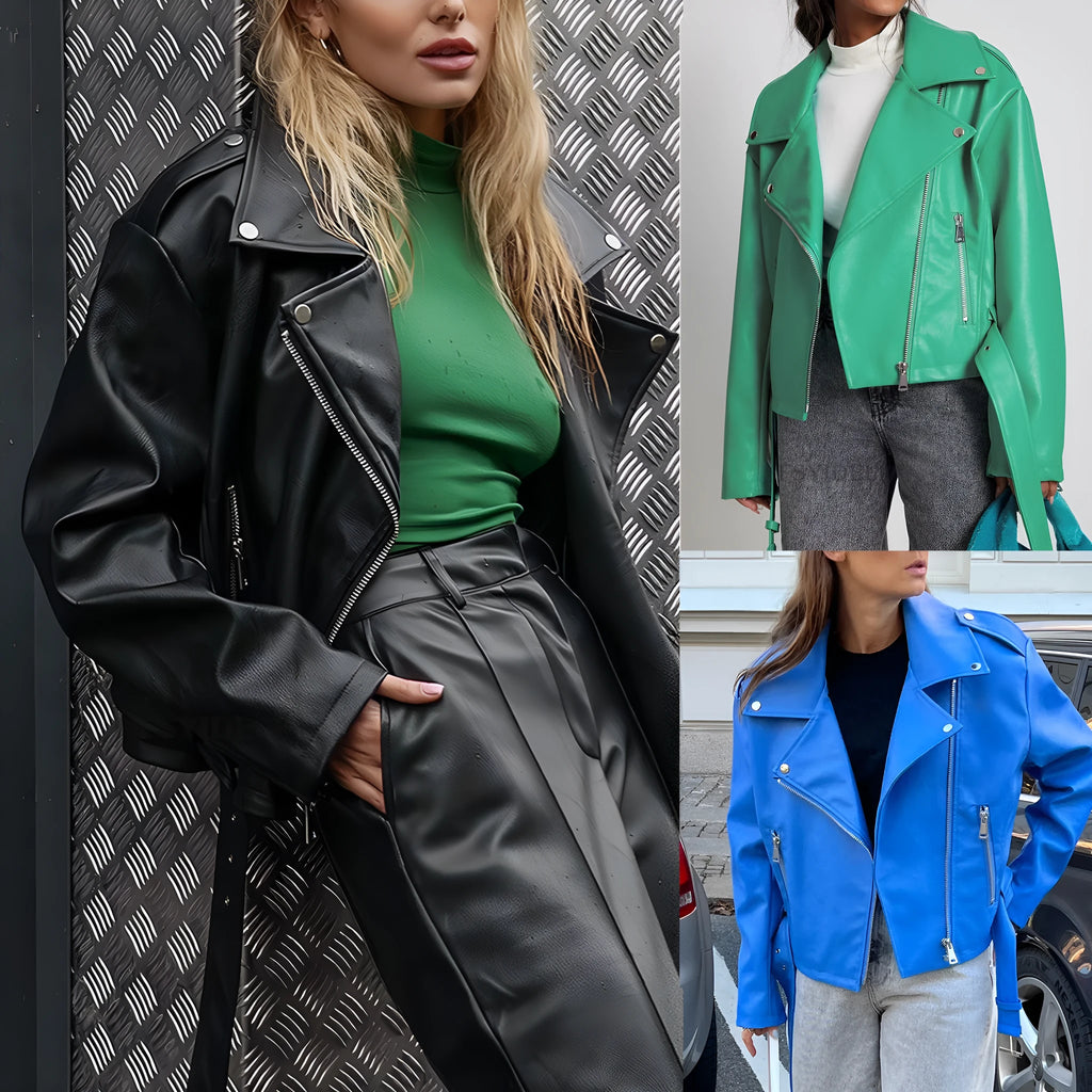 Black punk style jacket with a short belt, lapel, and Peter Pan collar on a hanger.